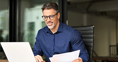 A business owner going through paperwork